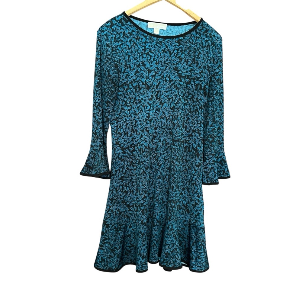 Michael Kors Womans Dress Round neck
Flounced sleeve,hemline. Blue black poly